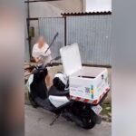 mulher-quebra-moto-da-sabesp-e-joga-pedra-contra-funcionario.-veja